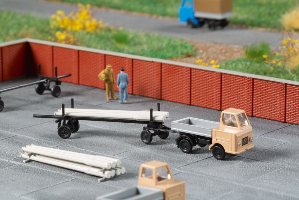 Auhagen 44658 Multikára M22, s oplenovým přívěsem pro dlouhý náklad, stavebnice